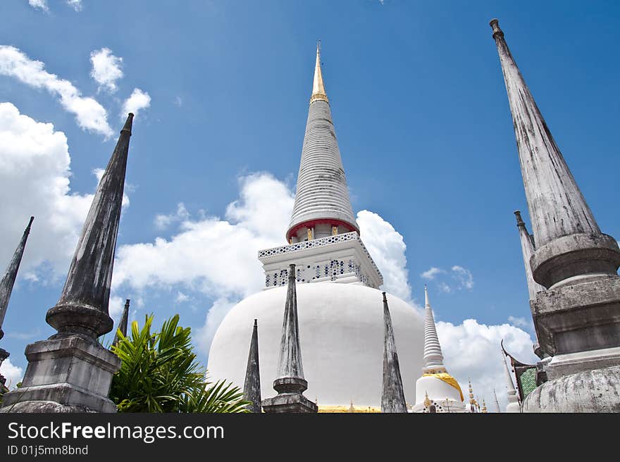 Huge famous pagoda with real gold on the top, south of Thailand. Huge famous pagoda with real gold on the top, south of Thailand.