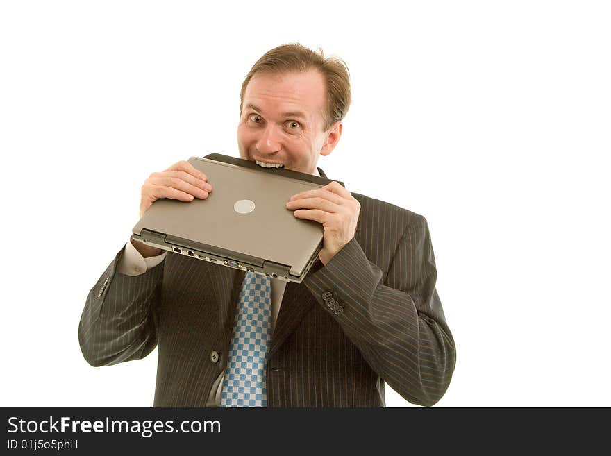 Young businessman bite off laptop