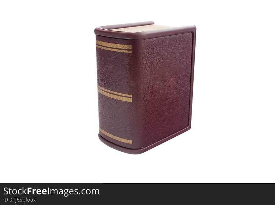 Brown book with golden stripes isolated on white background. Blank cover.