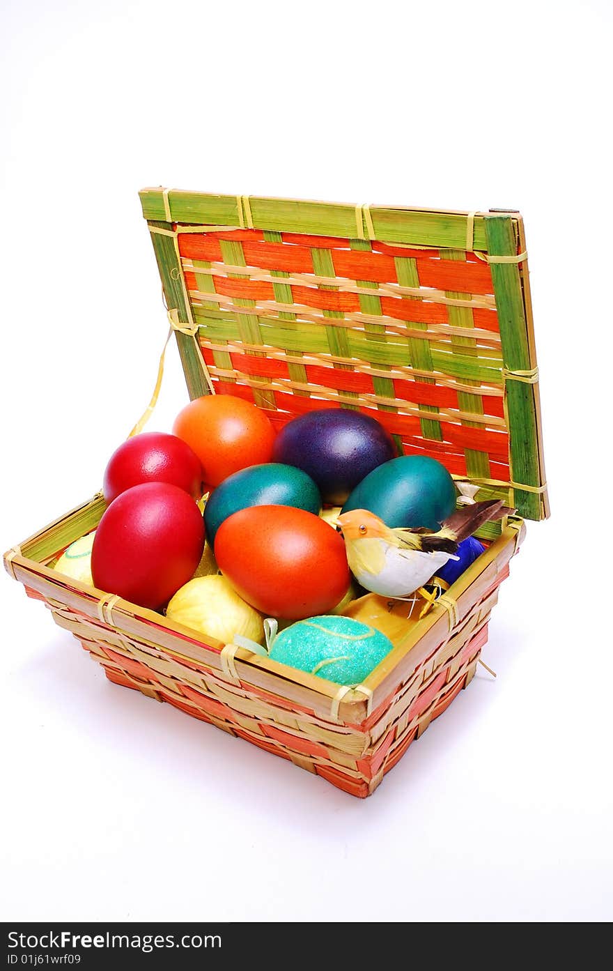 Colorful easter eggs in box isolated on white background