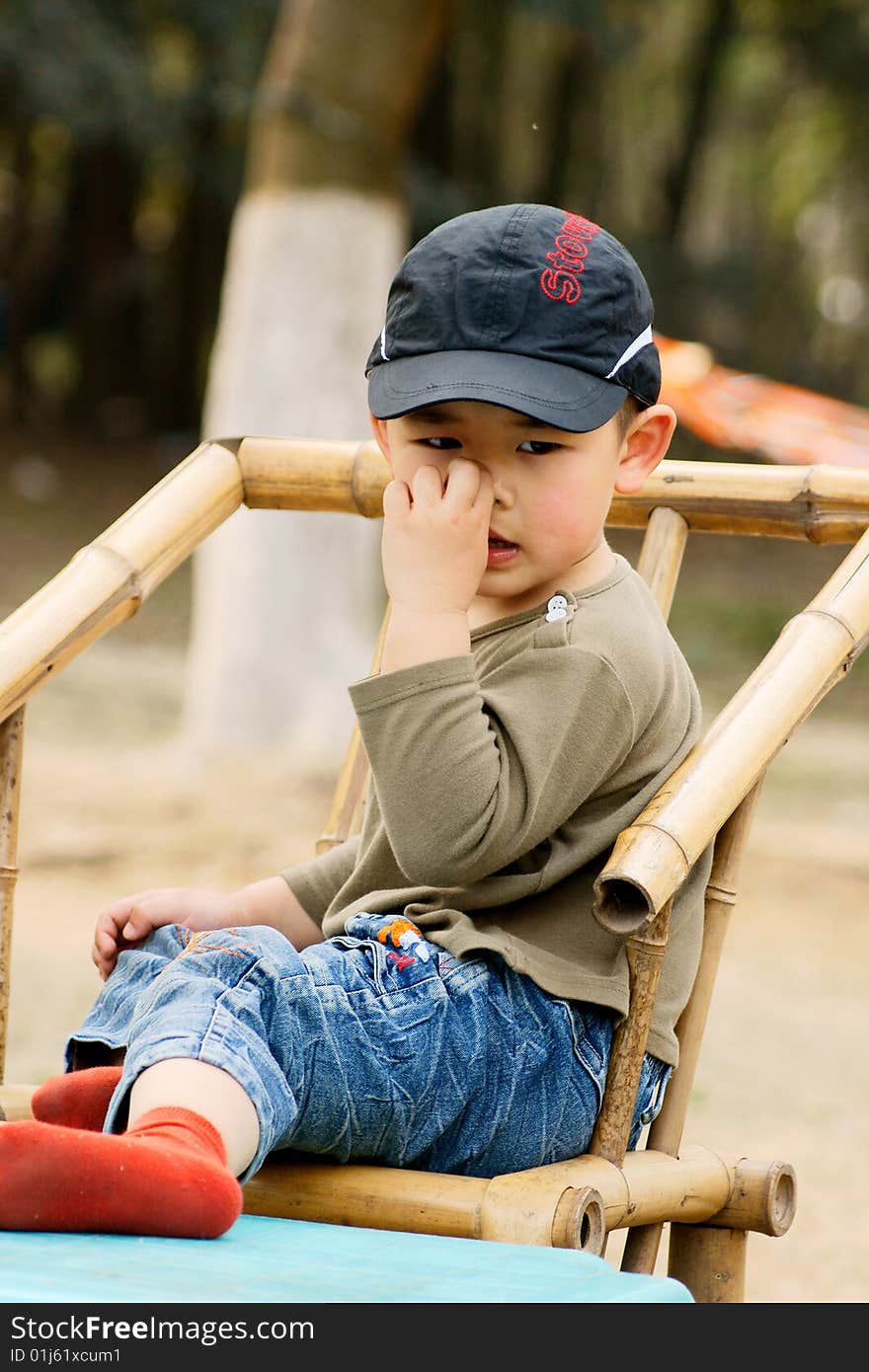 Boy picking nose