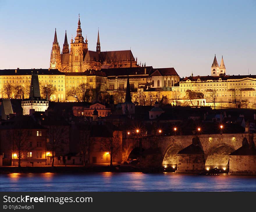 Prague gothic Castle past Sunset on Vltav