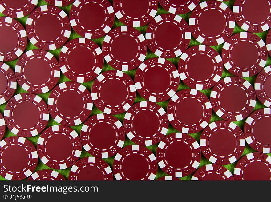 Many red poker chips background