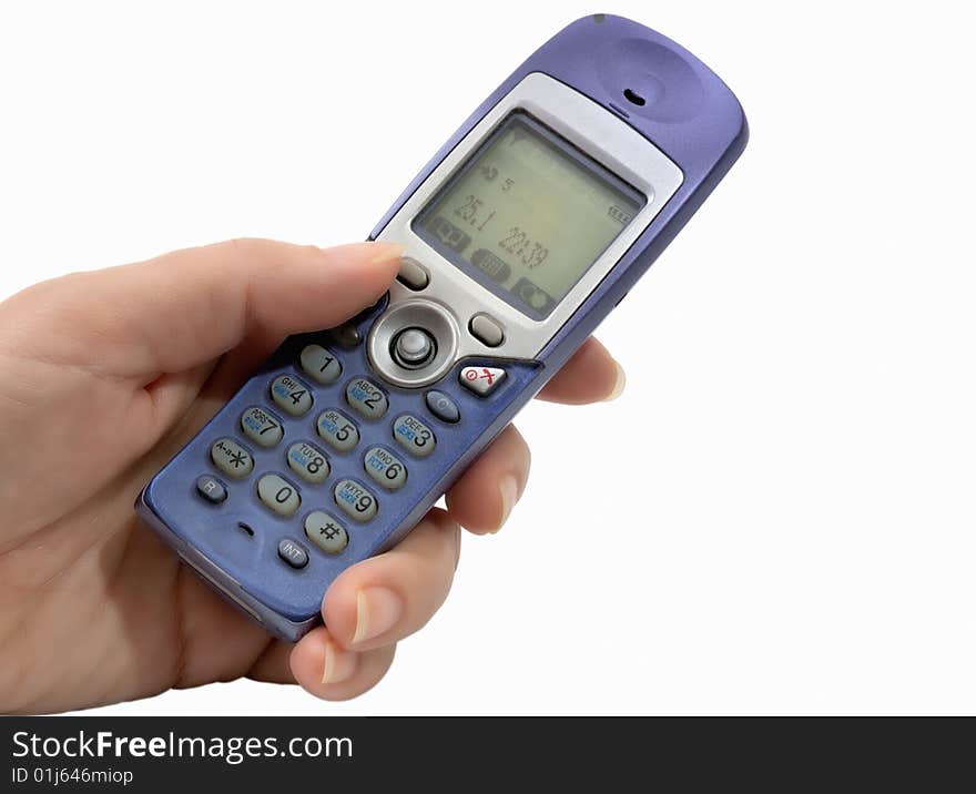 Telephone tube in  hand on a white background