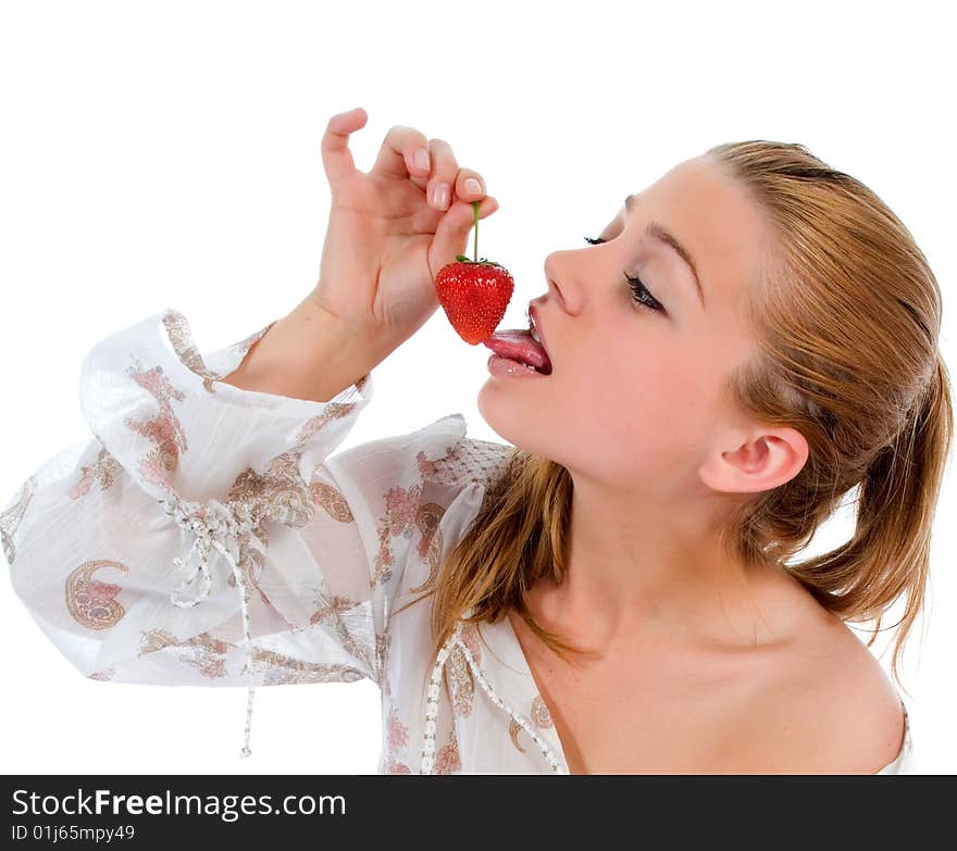 Beautiful girl with strawberry over white