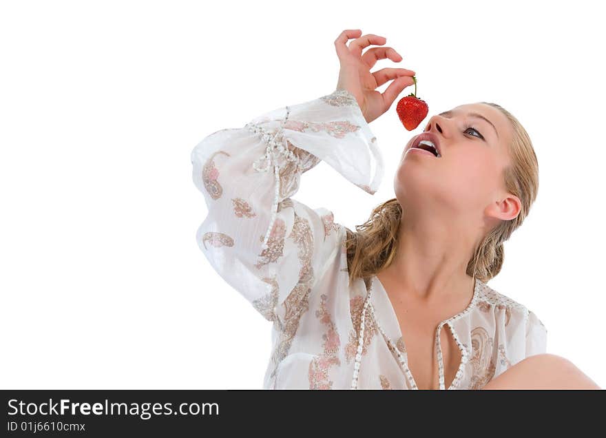 Beautiful girl with strawberry over white