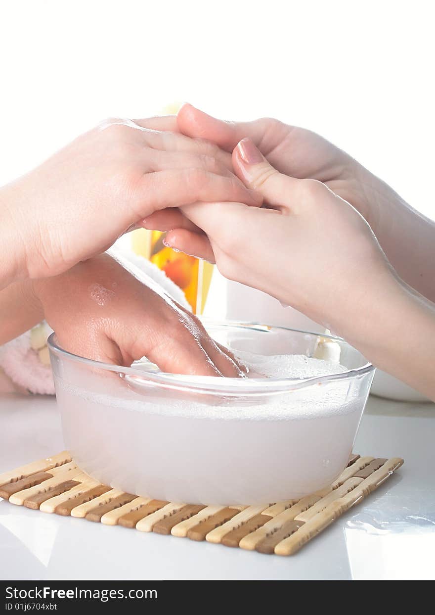 Spa process with female hands.