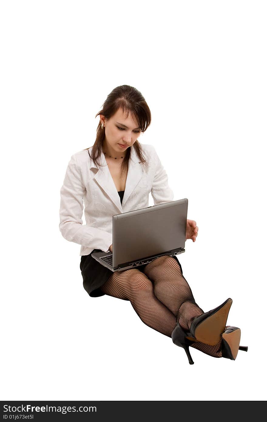 Young businesswoman with laptop sit