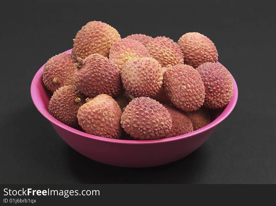 Closeup of fresh litchis - shot in studio. Closeup of fresh litchis - shot in studio