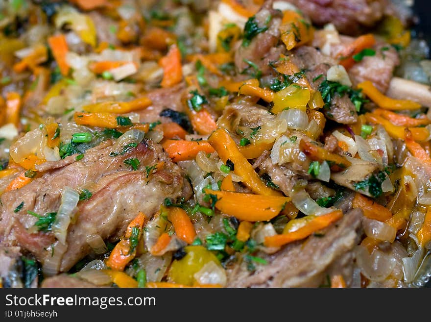 Tasty fried meat and vegetables. Tasty fried meat and vegetables