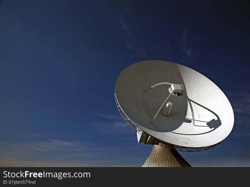 A radio telescope and blue sky, Germany