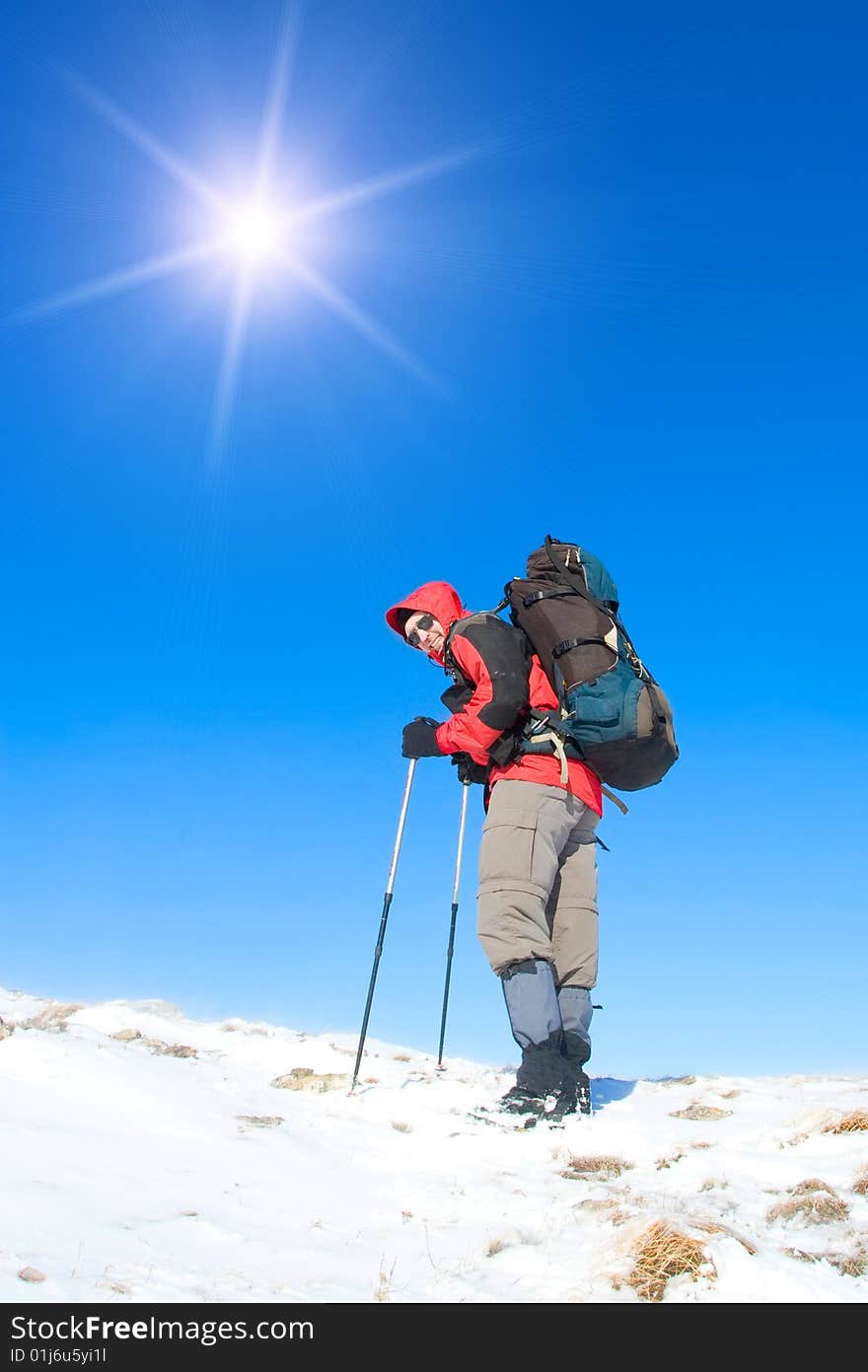 Hiker are in winter mountains