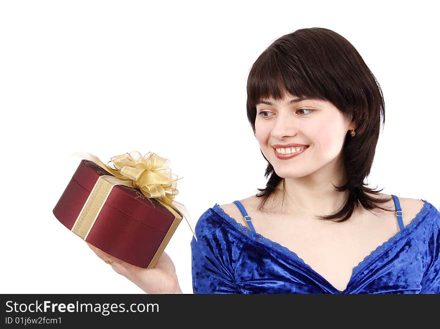 Beautiful smiling woman with a gift. Attractive girl holding purple box with gold ribbon. Isolated over white background. Happy girl is surprising at present. Beautiful smiling woman with a gift. Attractive girl holding purple box with gold ribbon. Isolated over white background. Happy girl is surprising at present.