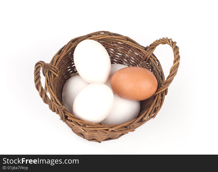 Chicken eggs in a basket