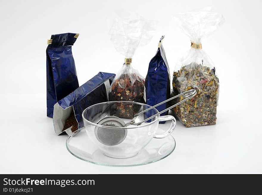 tea cup, filter and bags isolated on a white background