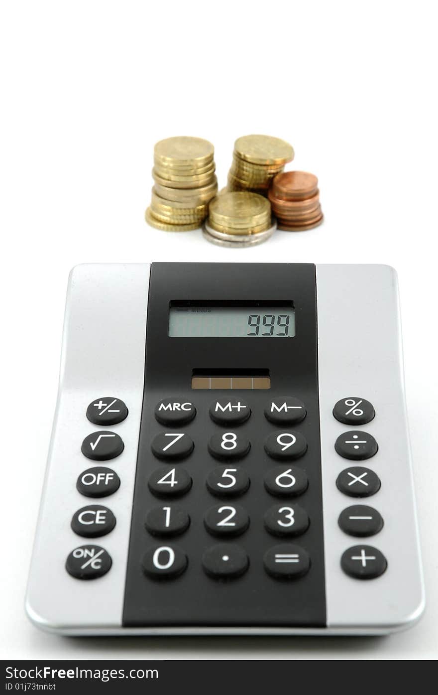 Calculator and money against white background