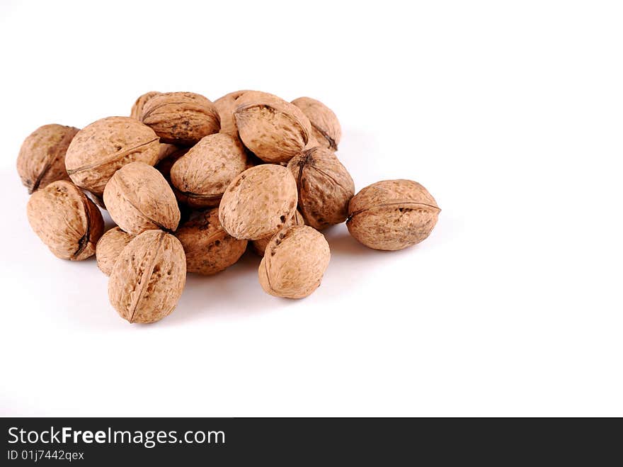 Walnut in an environment of other walnuts in various compositions.