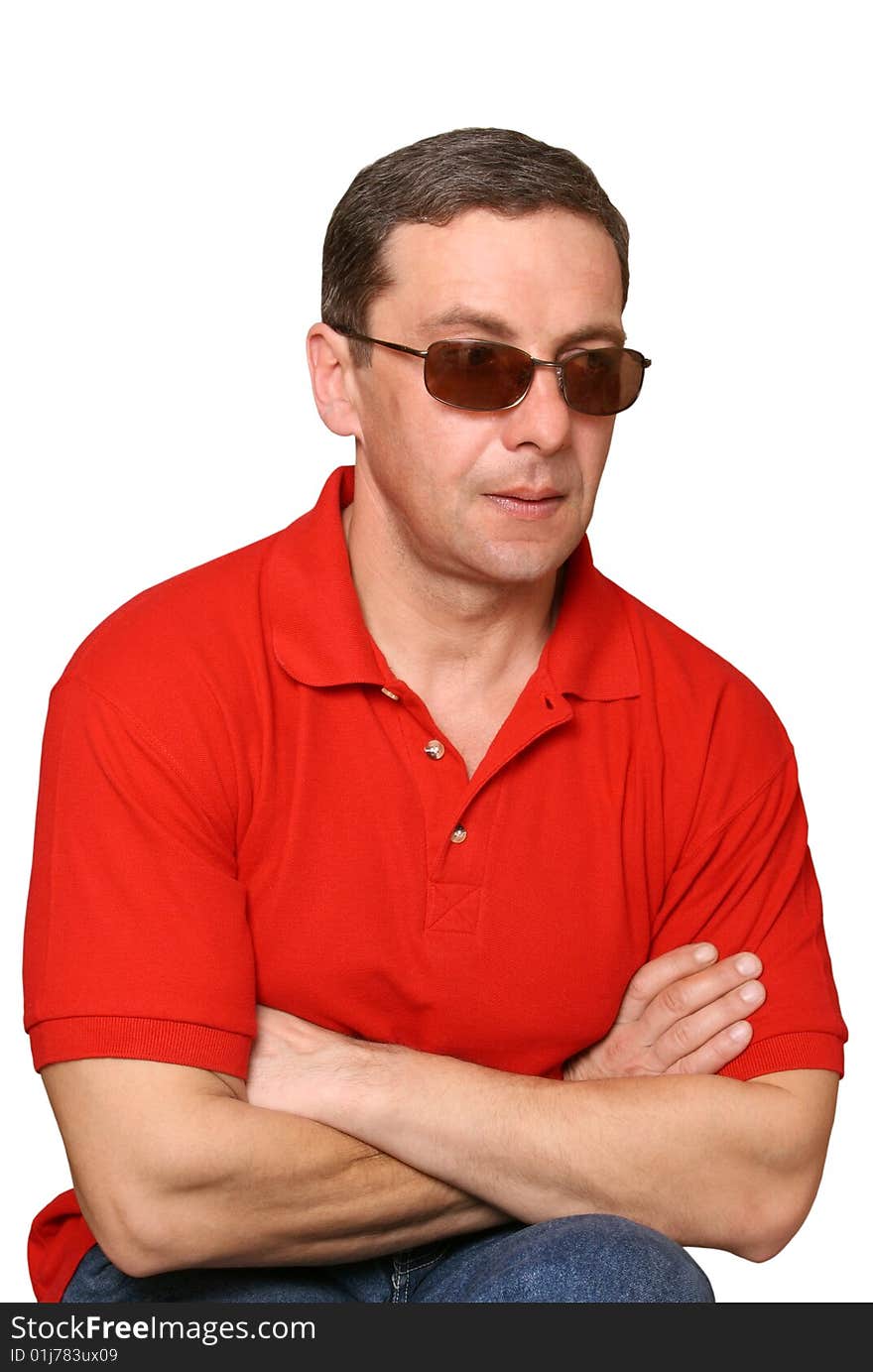 The man in dark glasses separately on a white background. The man in dark glasses separately on a white background