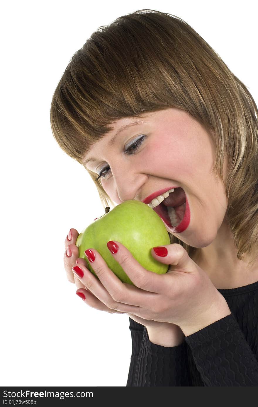 Young beauty woman eating juicy green apple. Young beauty woman eating juicy green apple