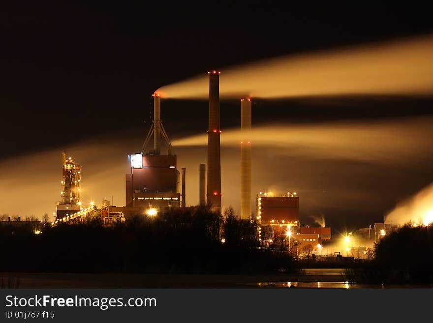 Factory smoke at night with long exposure effect