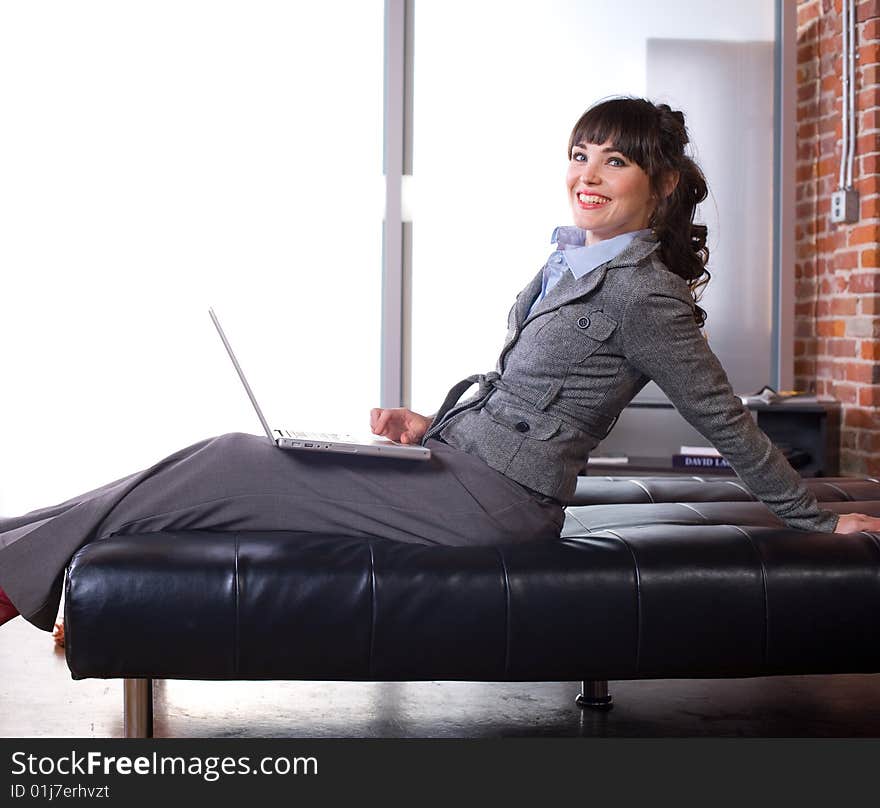 Business woman laptop in modern office. Business woman laptop in modern office