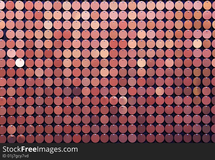 Background of red many small metall circles