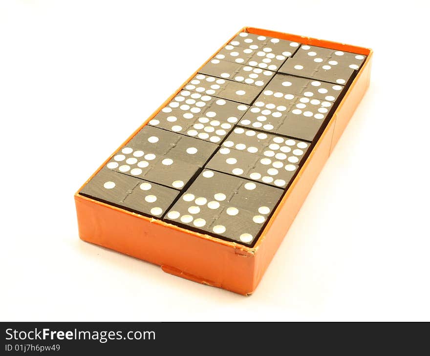 Box of dominoes isolated on a white background.