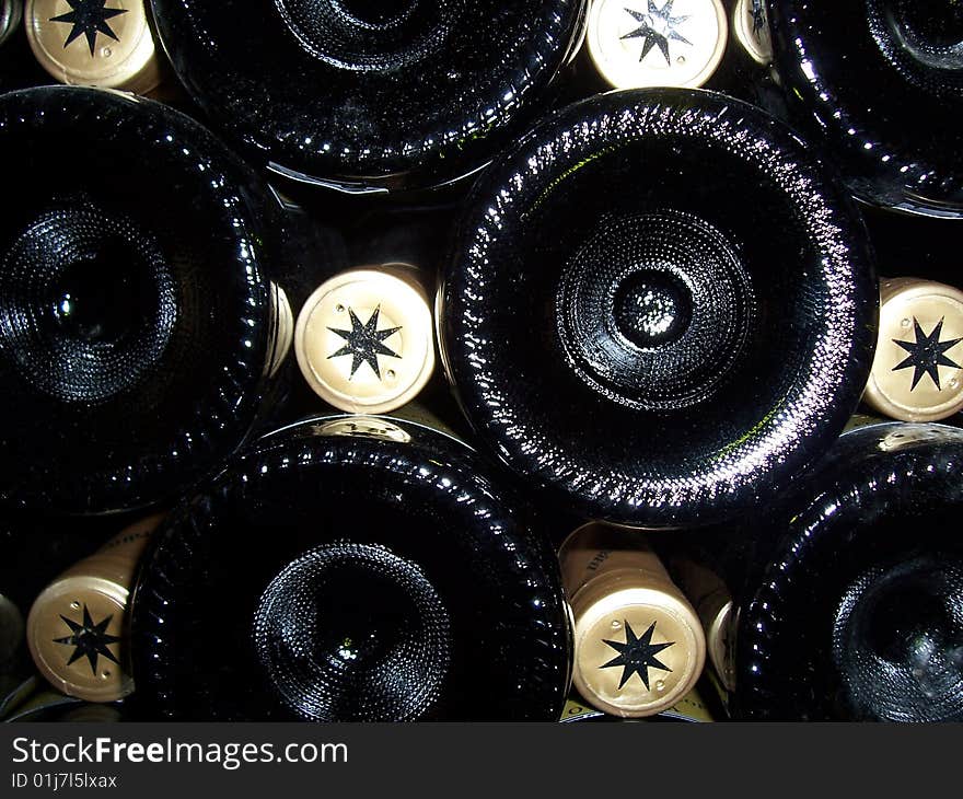 Wine bottles heap on in shelf