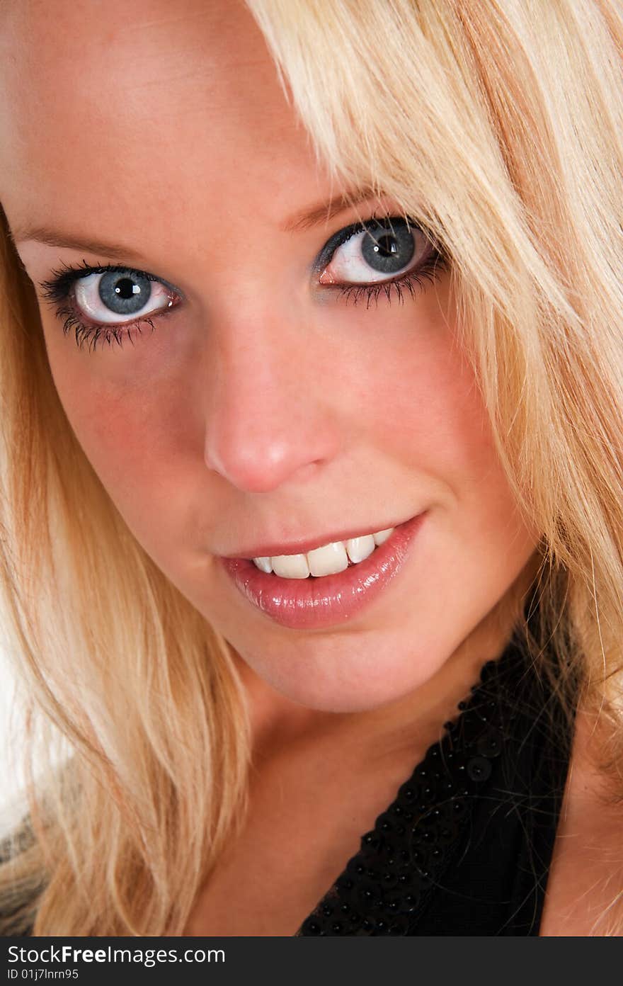 Portrait of a beautiful blue eyed girl, close up. Portrait of a beautiful blue eyed girl, close up.