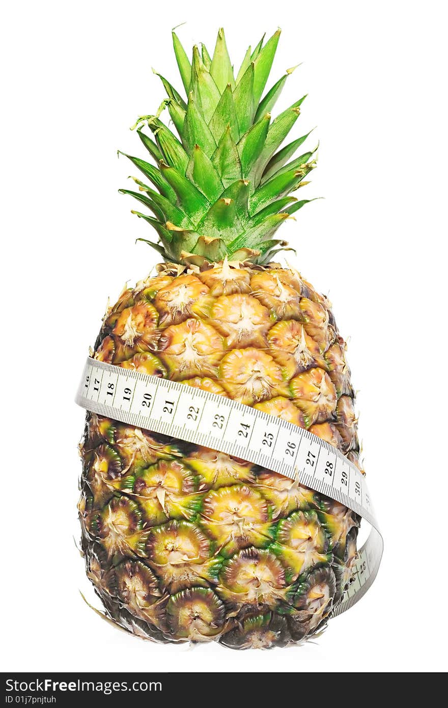 Pineapple with measuring tape around isolated on white background.