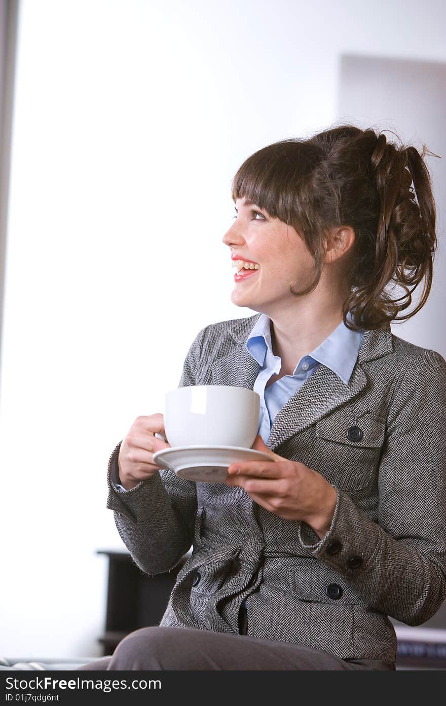 BUsiness woman having her morning coffee. BUsiness woman having her morning coffee