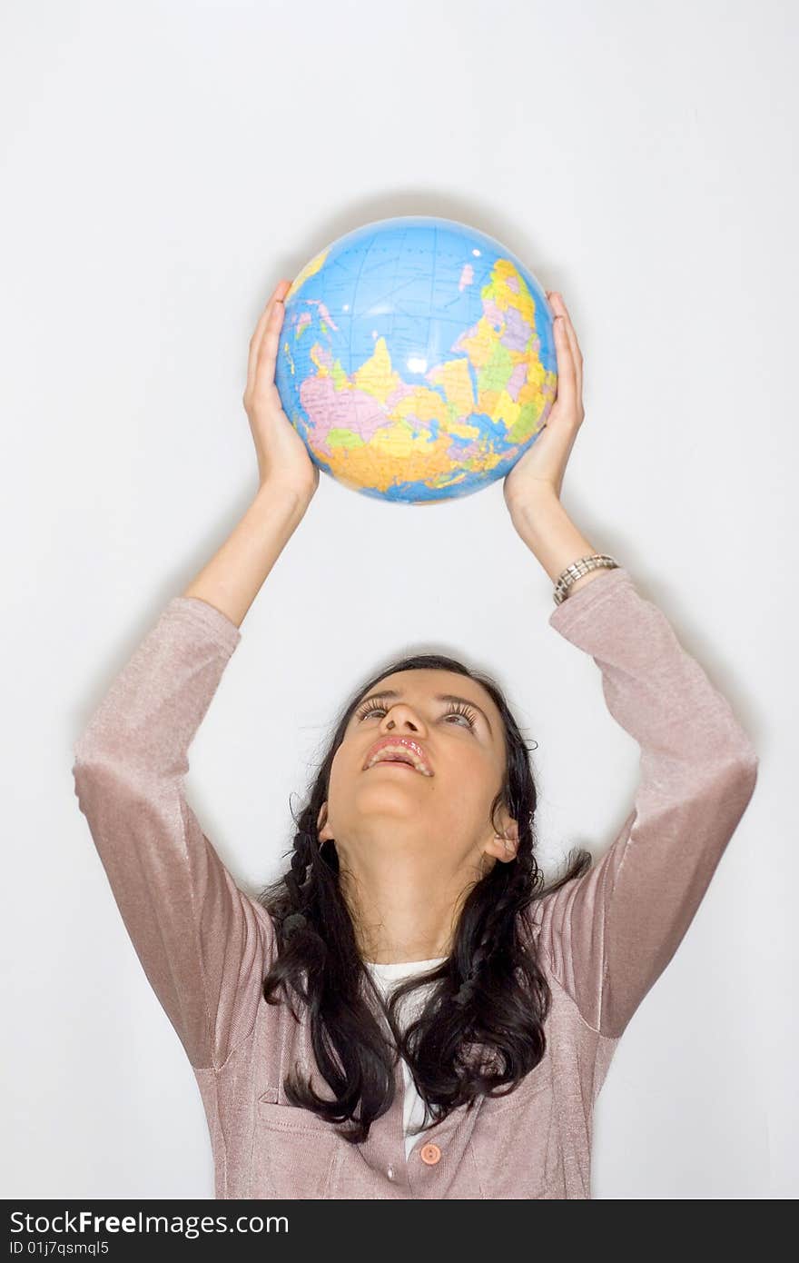 Young woman holding globe in her hands. Young woman holding globe in her hands