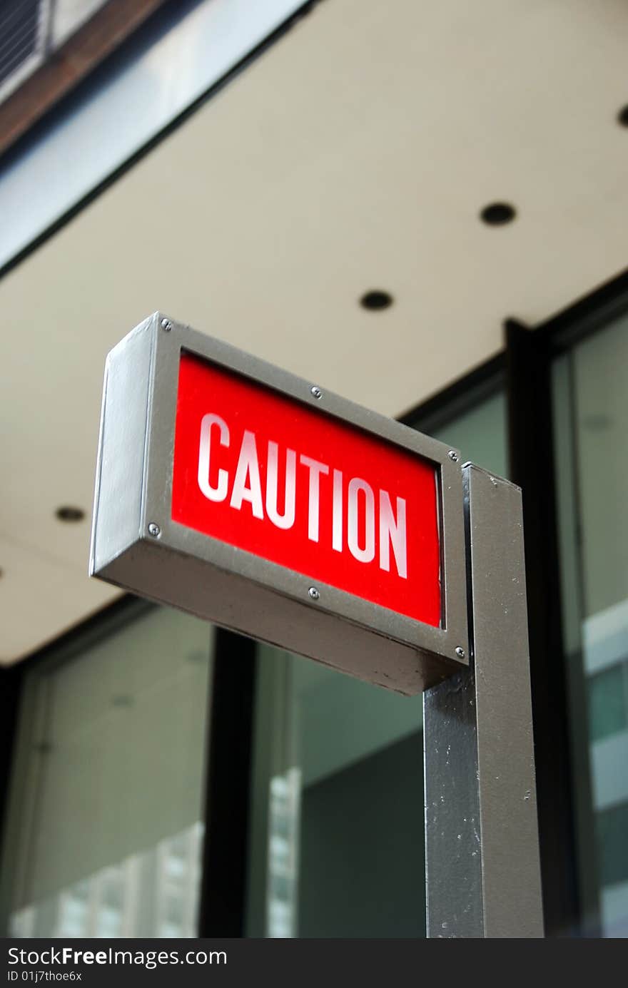 Warning sign outside of a building for security alert. Warning sign outside of a building for security alert