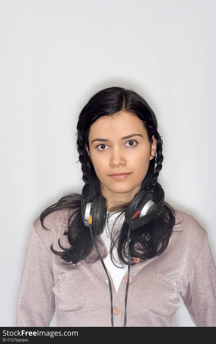 Young beautiful woman listening music