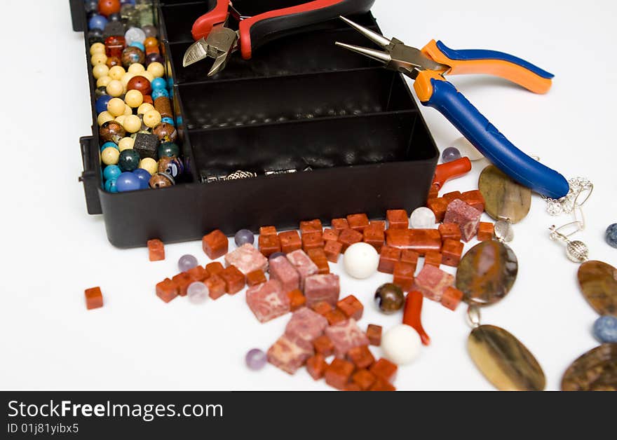 Jewellery making on a white background