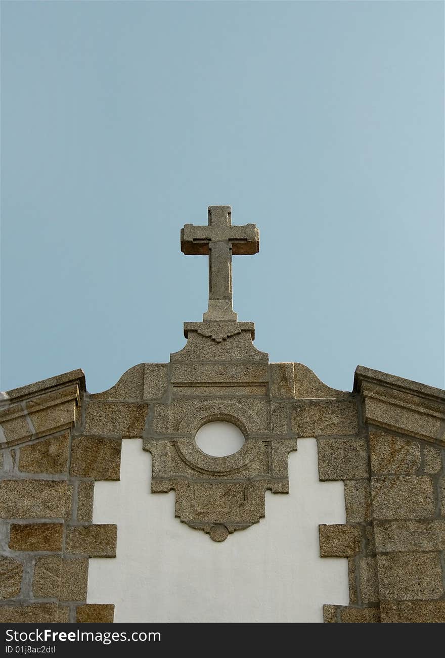 Church stone cross on a sunny day. Church stone cross on a sunny day