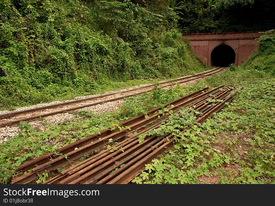 Train tunnel pass under the mountain in south of Thailand.