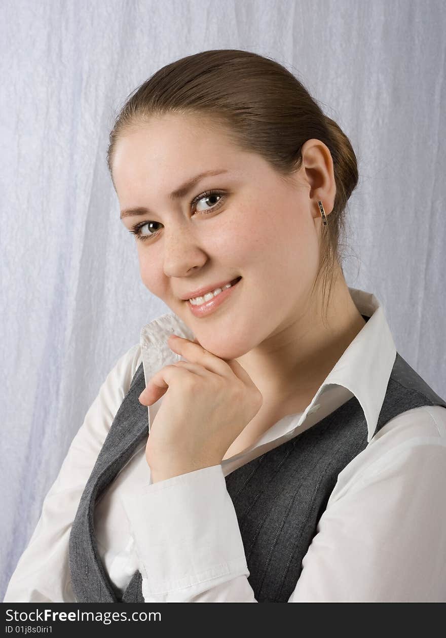 Young woman smiling and looking at photographer. Model Natalia Matveeva. Young woman smiling and looking at photographer. Model Natalia Matveeva.