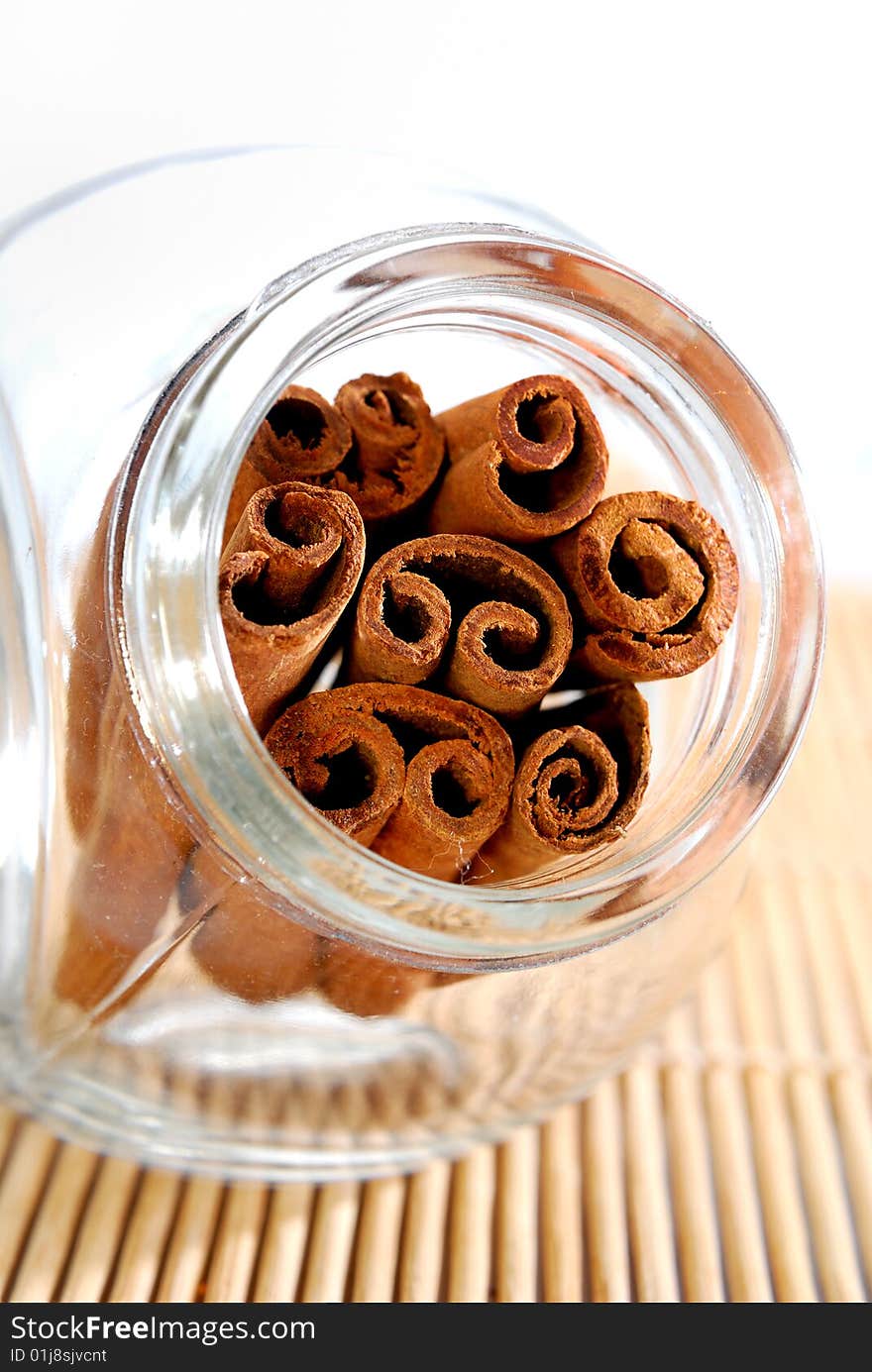 Cinnamon Stick in transparent container. Cinnamon Stick in transparent container