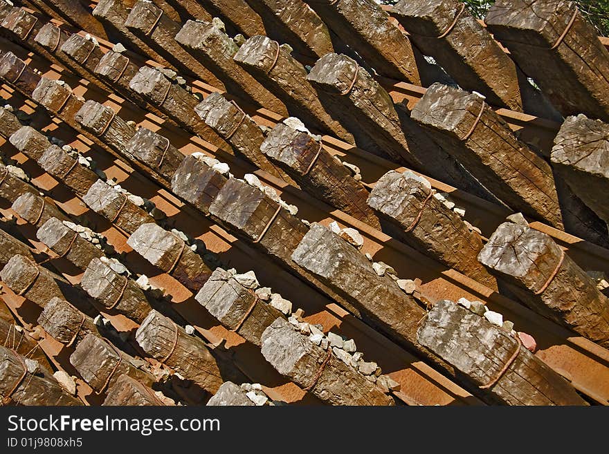 Wooden beams are stored for the railway