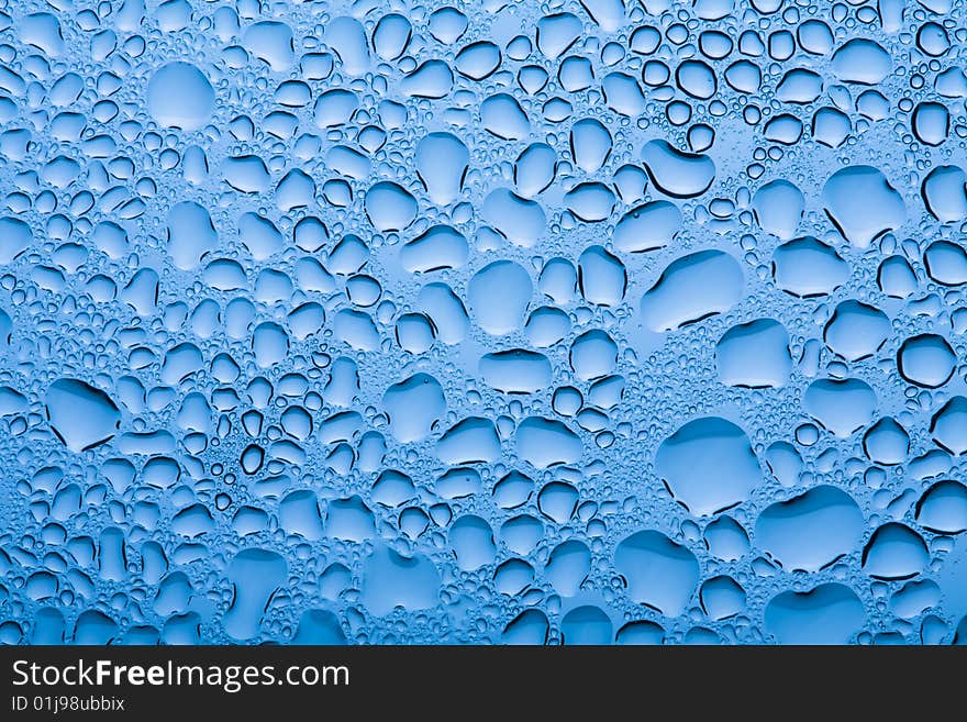 Blue water drops background