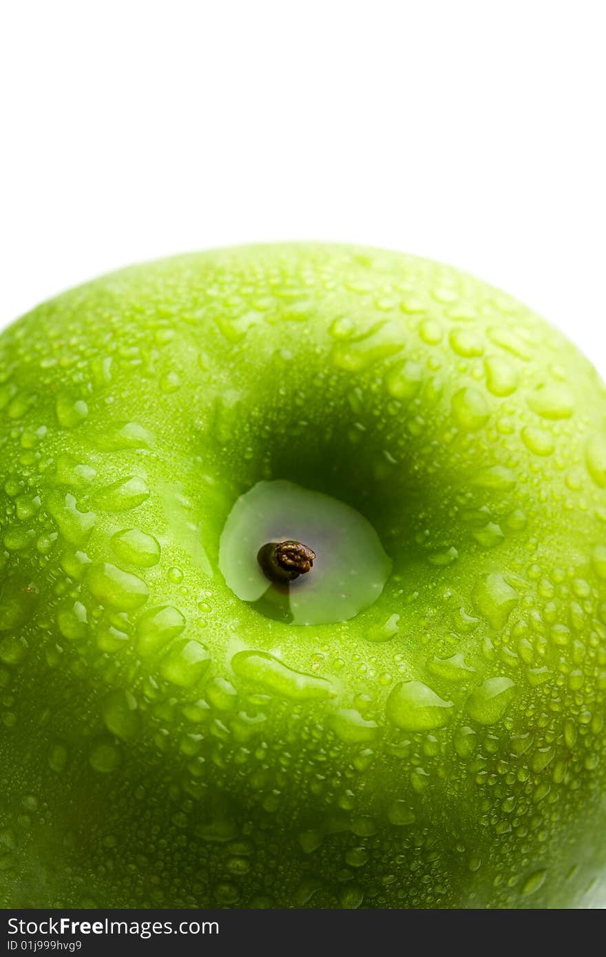 Fresh green apple with water droplets isolated