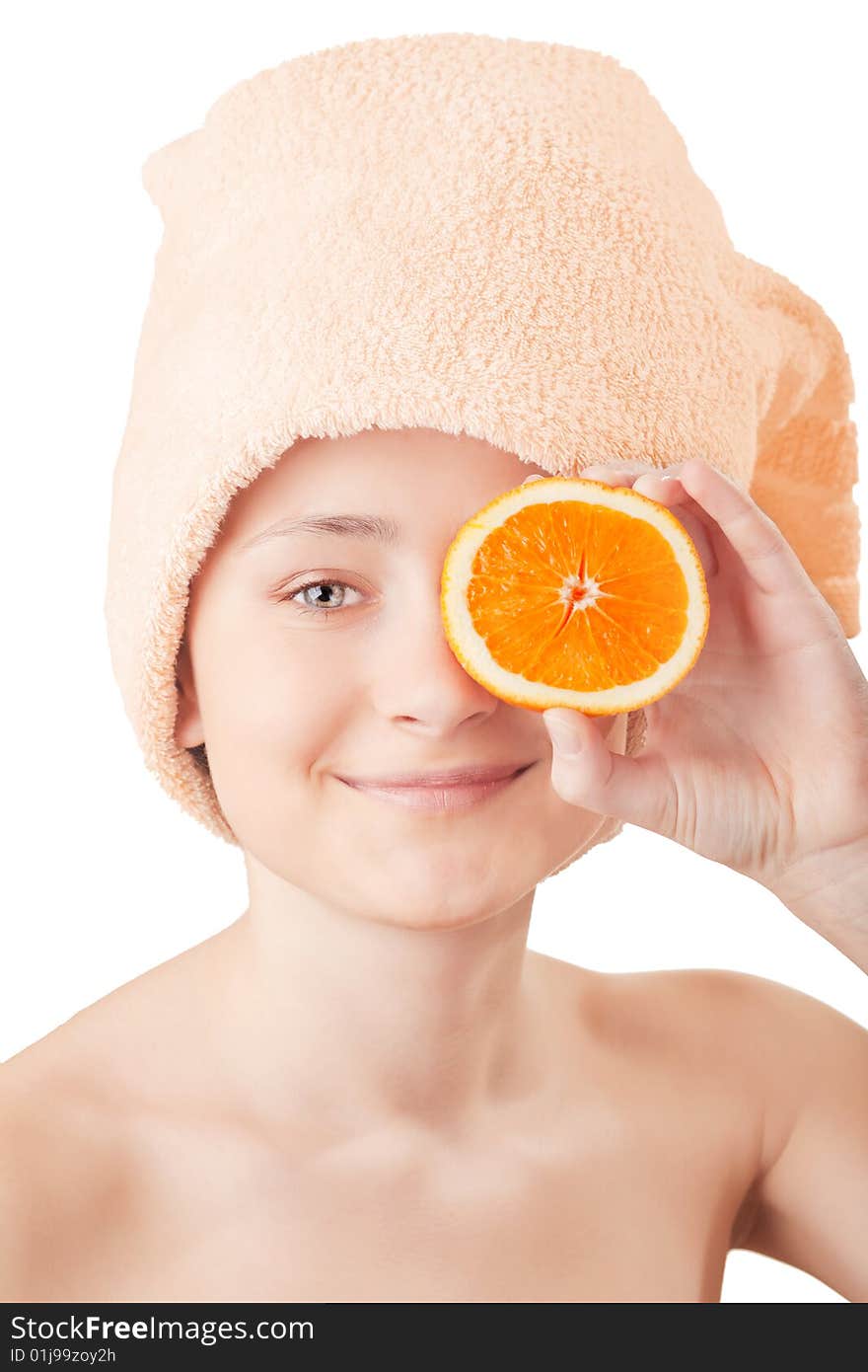 Pretty young girl with a an orange on white background