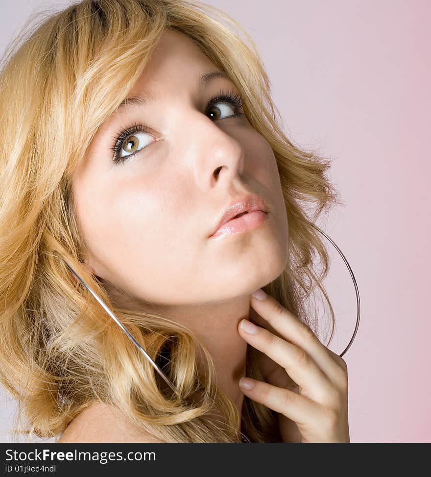 Beautiful fashion woman portrait, isolated on pink background