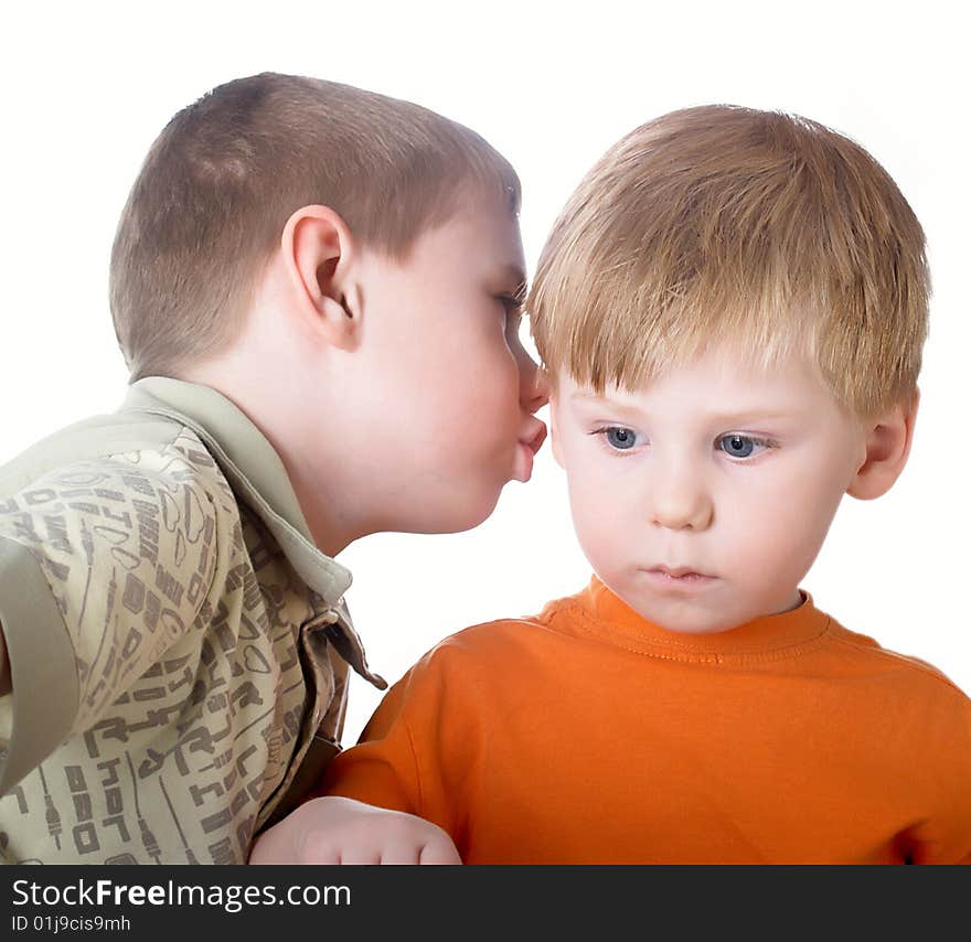 Two boys play on a white background. Two boys play on a white background