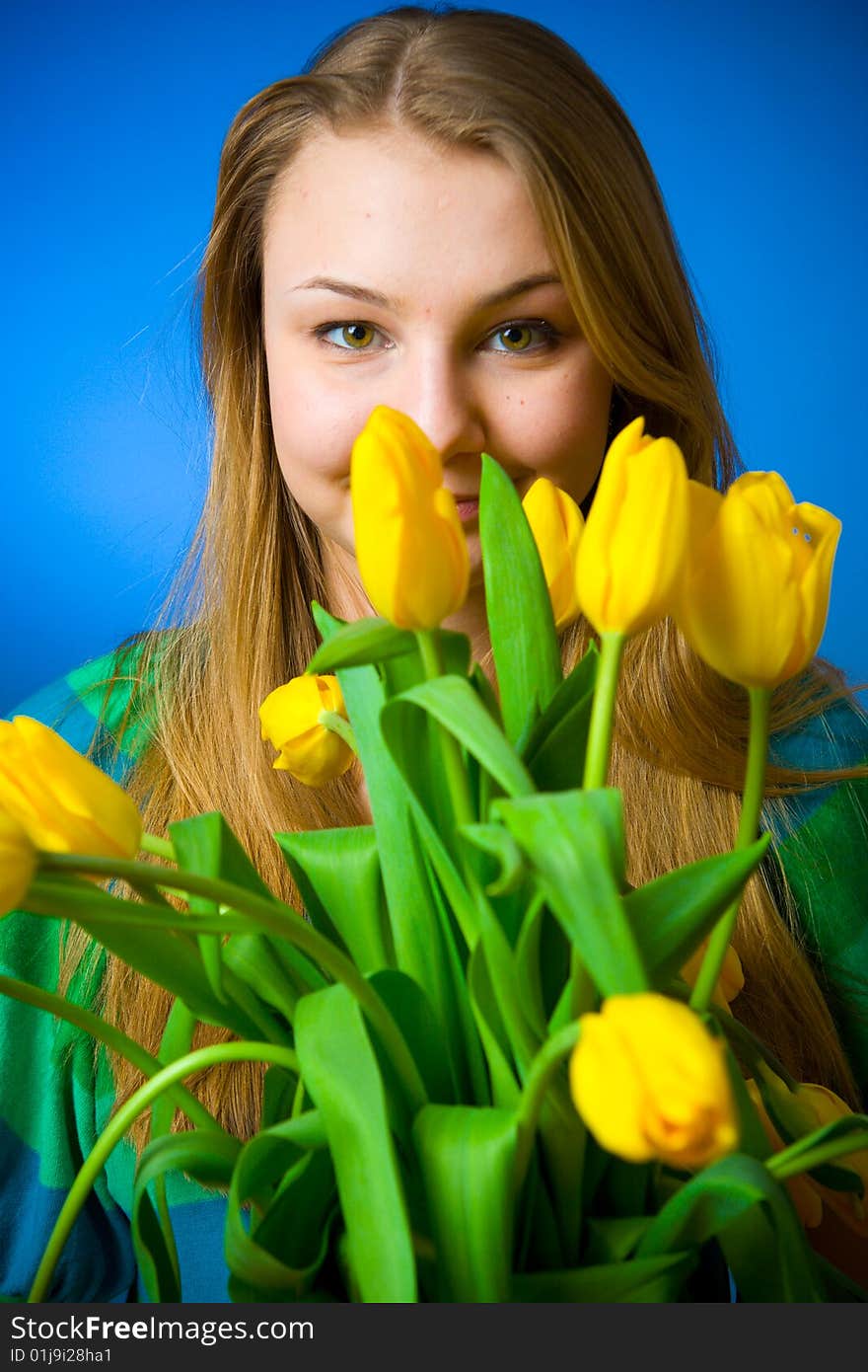 The beautiful girl with tulips