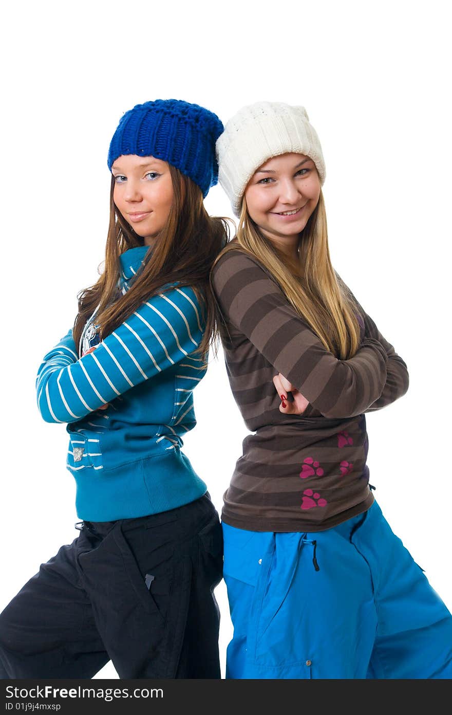 The two young attractive girls isolated on a white background