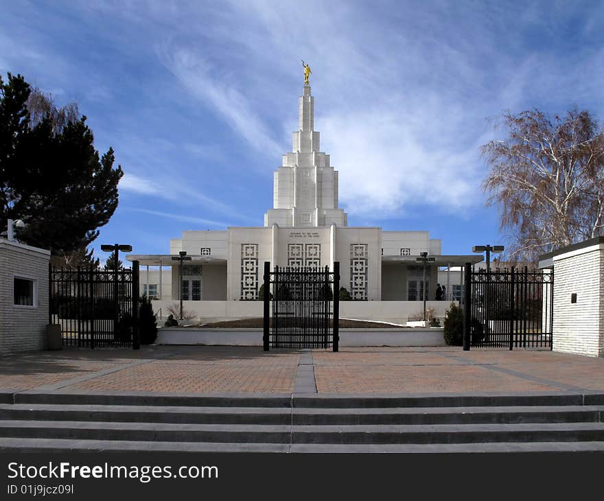 Mormon Temple with blue sky and clouds in background