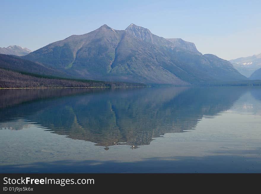 One of the mountains of Glacier National Park, reflected in the lake