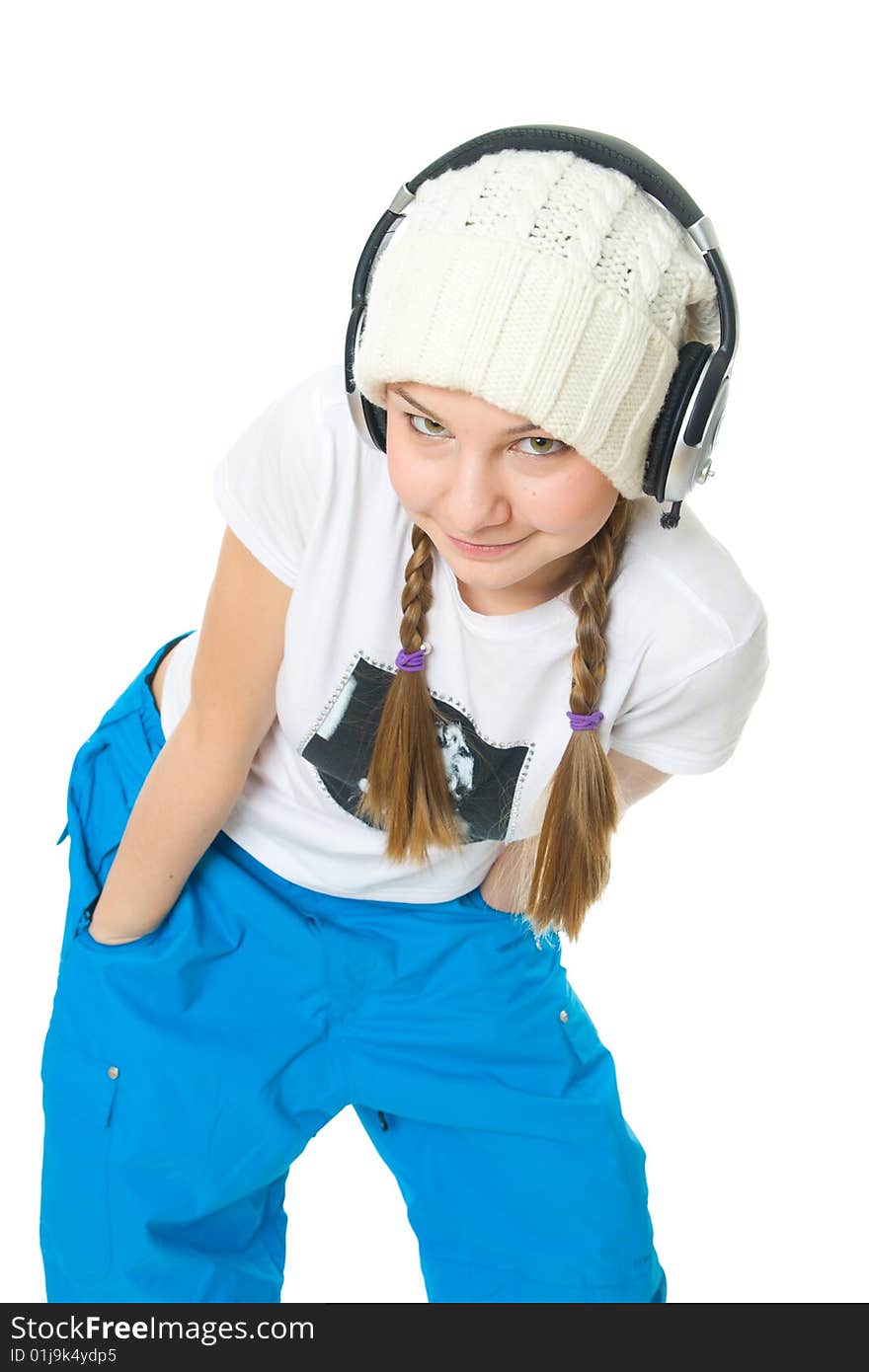 The young girl with a headphones isolated on a white background